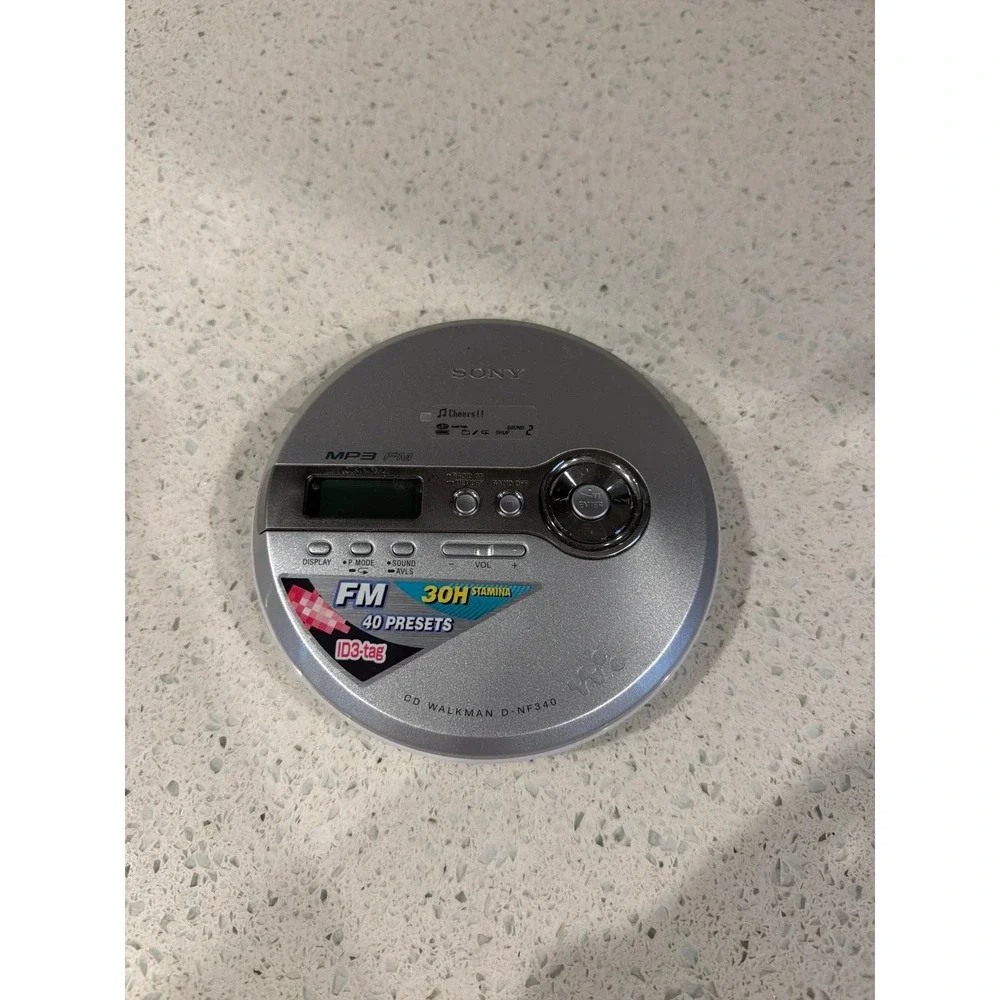 Sony D-NF340 Walkman MP3 FM CD Player 30H Stamina ID 3 Tag 40 Presets